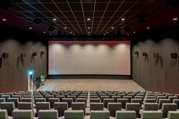 Auditorium with advanced acoustic ceiling panels and lighting